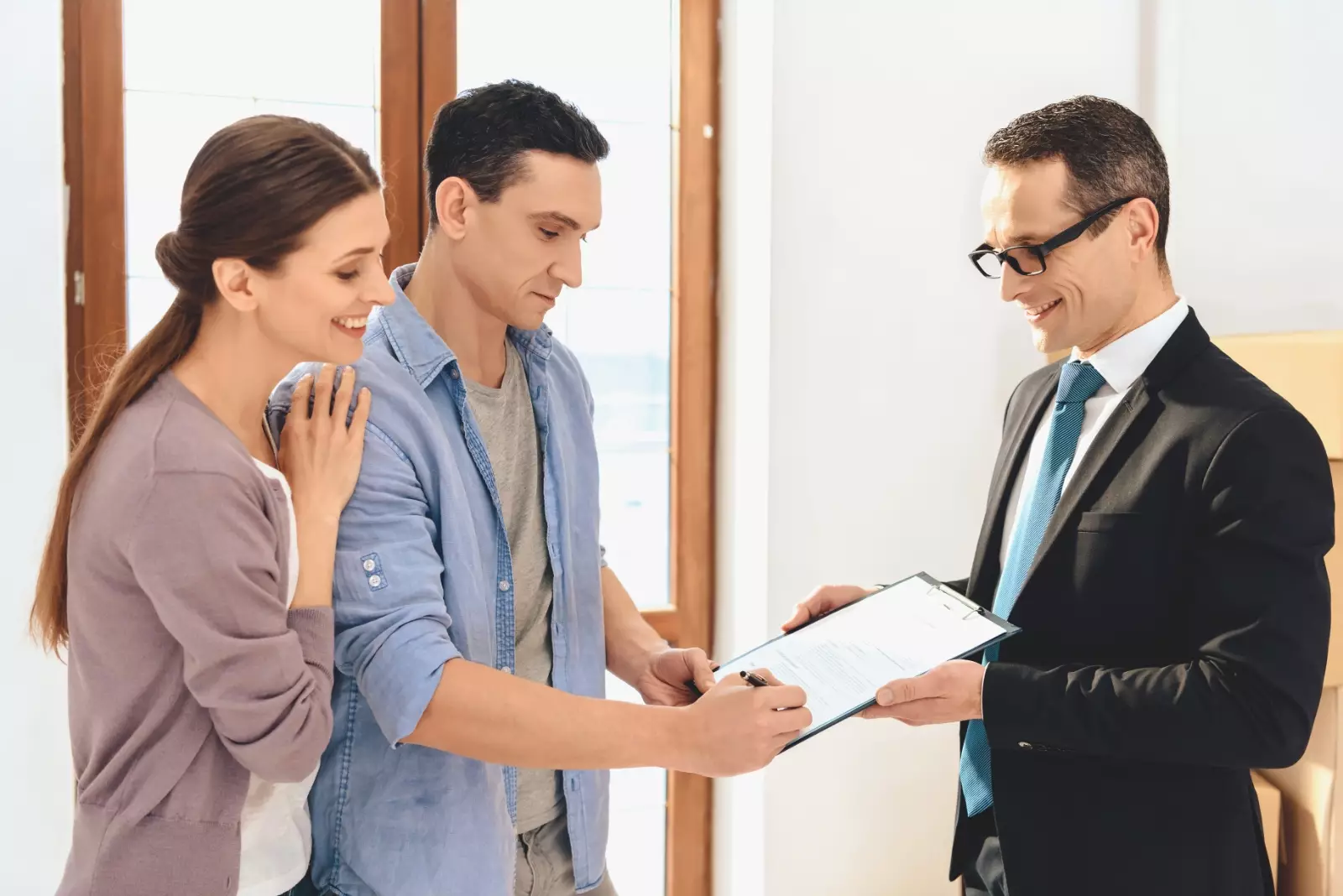 Realtor with family in new home